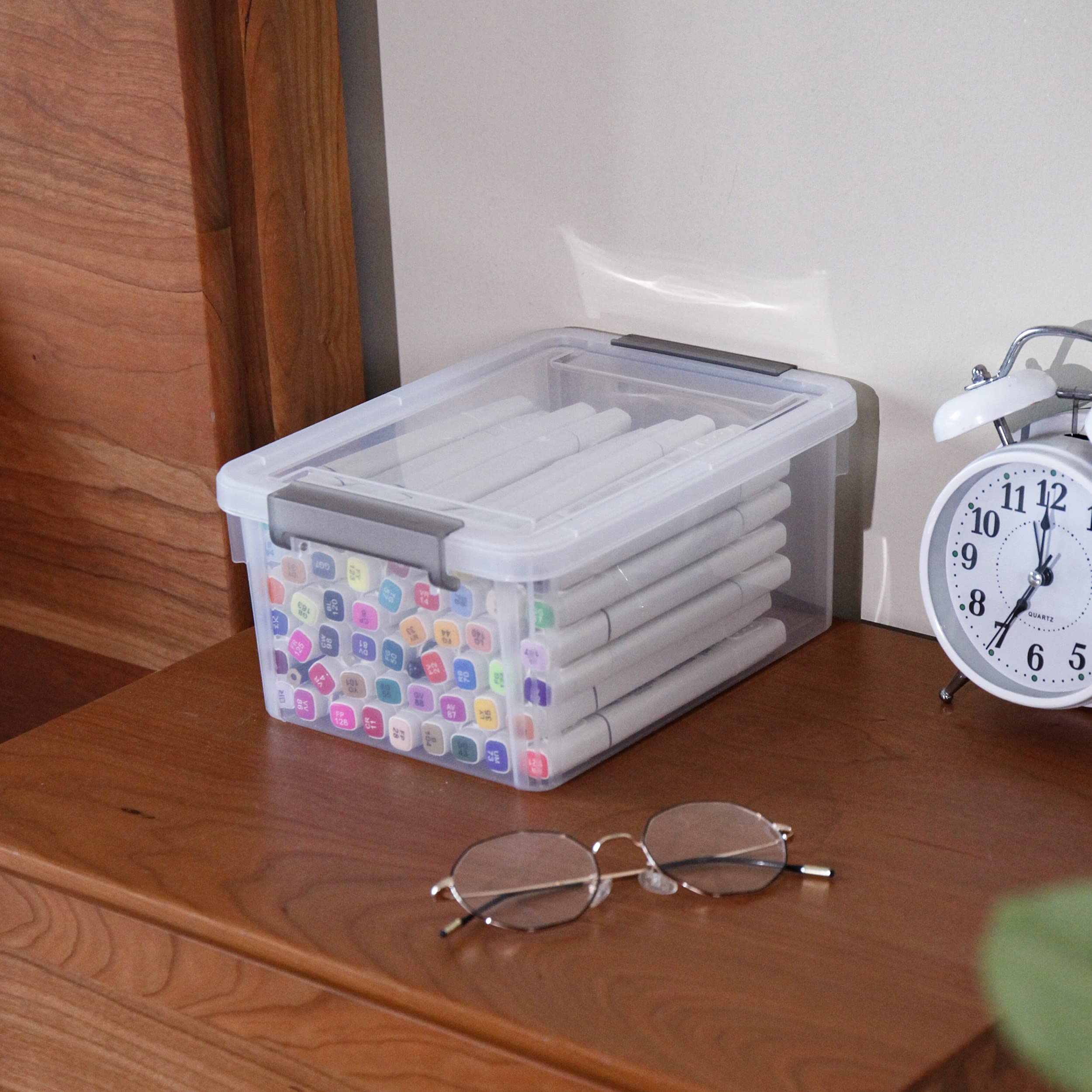 Anywish bin beside hand showing compact size and portability benefit