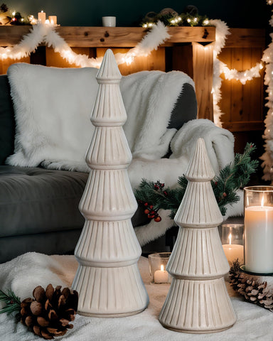 AOMOONOA trees placed in a miniature winter village enhancing seasonal display cohesion