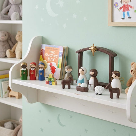 AOMOONOA angel, shepherd and animals grouped to create a warm tableau