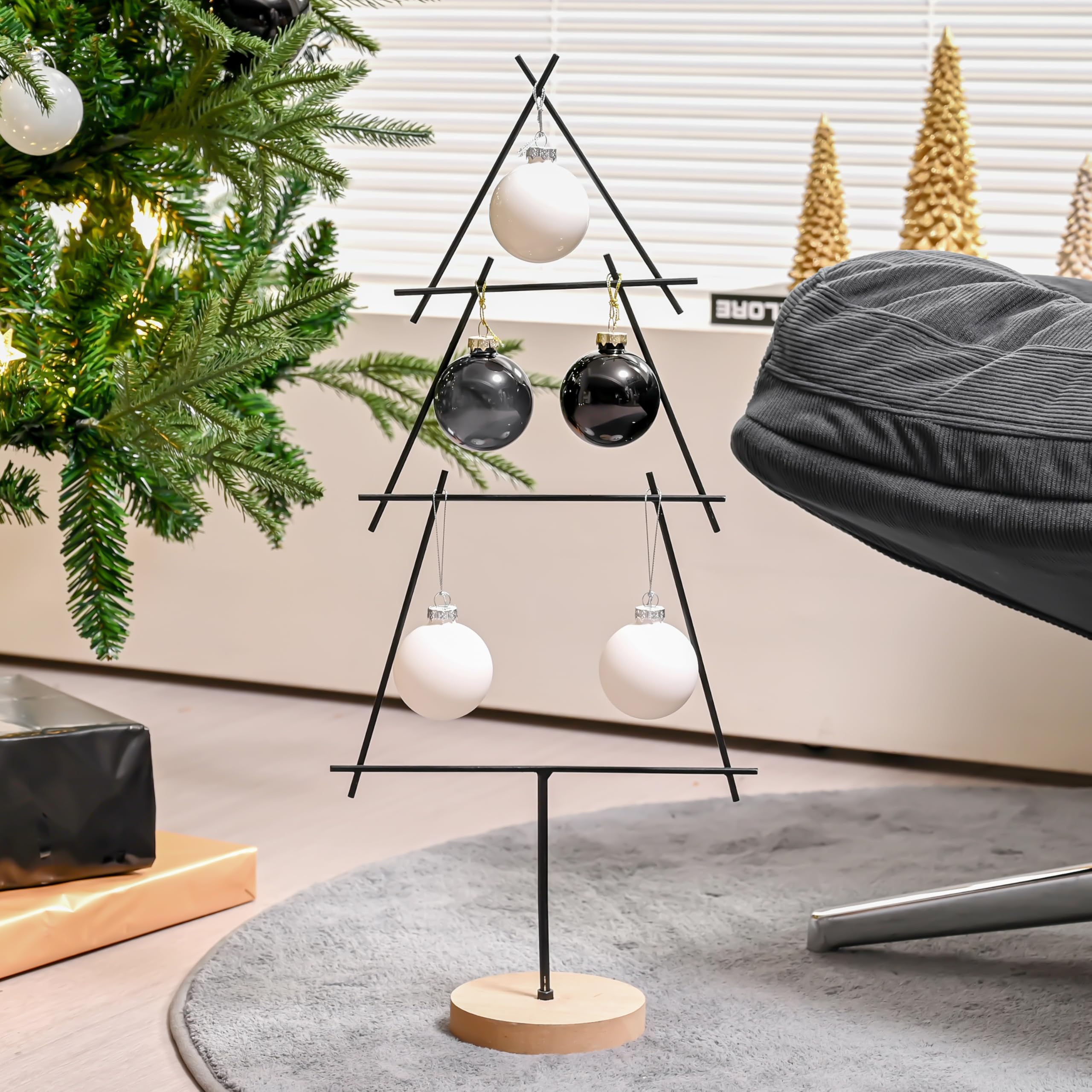 AOMOONOA ornaments beside a ruler demonstrating the 2.36-inch size for scale