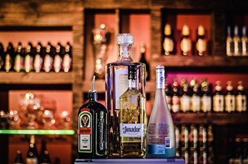 AOZITA pourer inserted in liquor bottle during use, controlled pour benefit