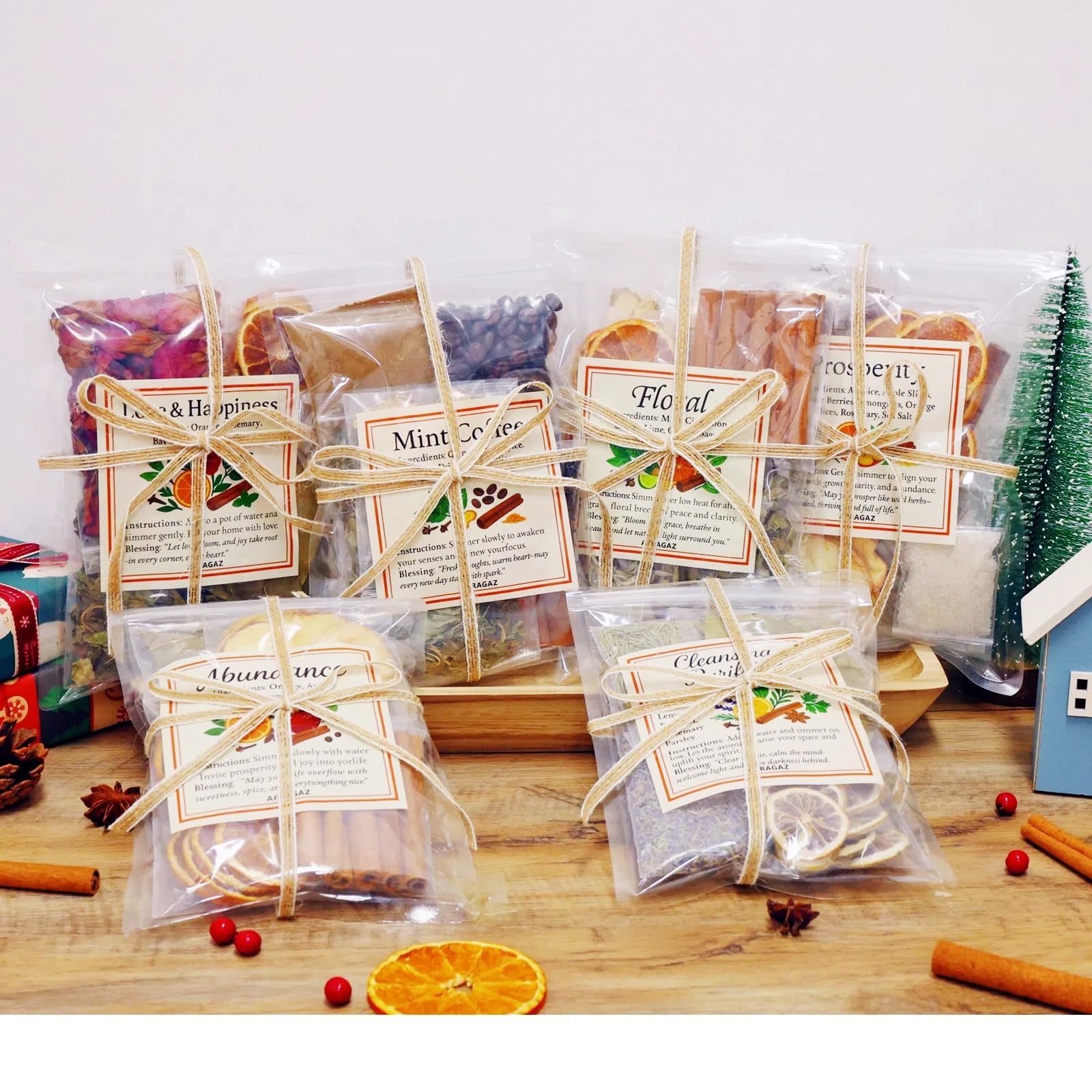 Apragaz front packaging showing six themed simmer sachets and benefits