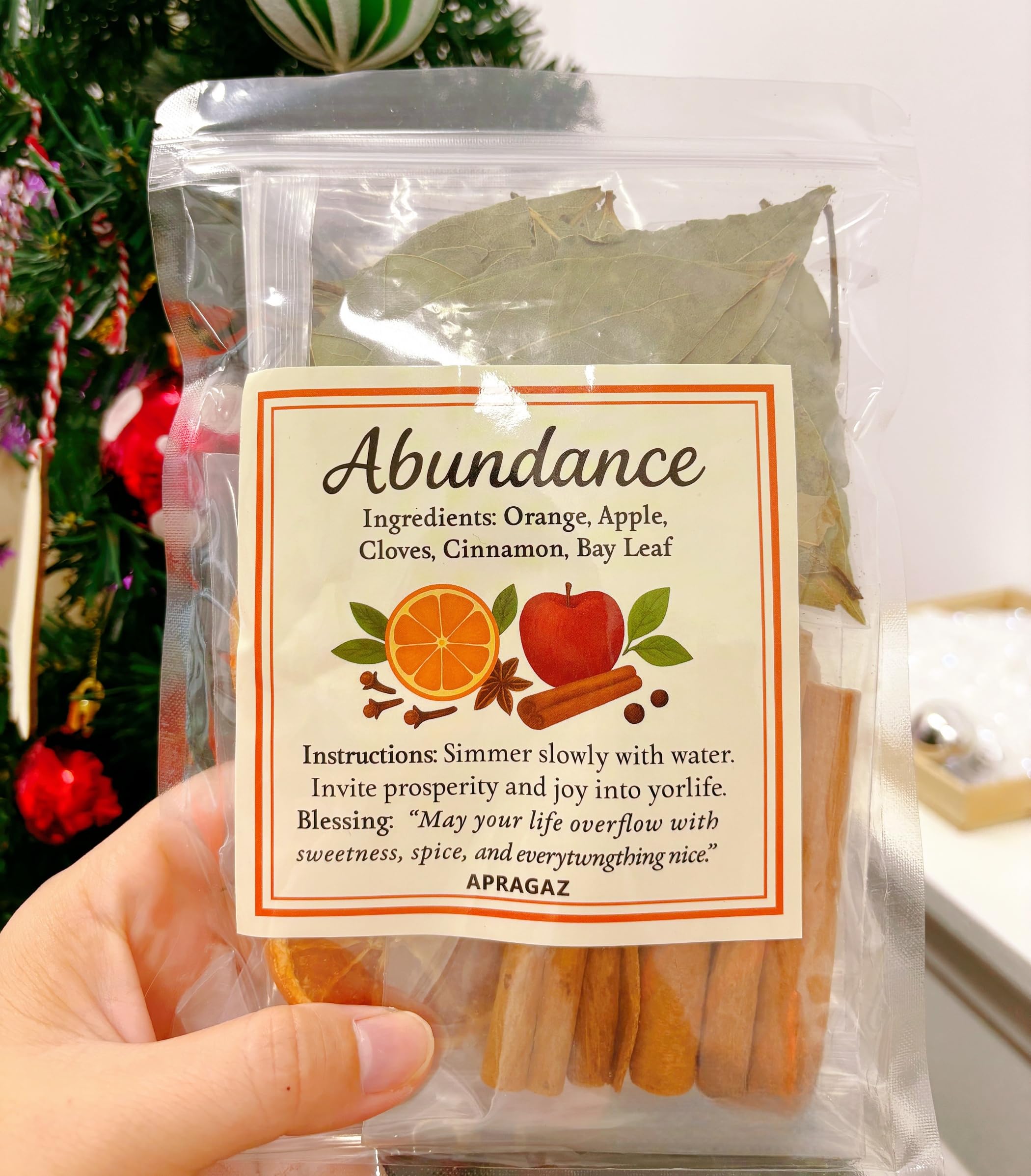 Apragaz label and blend names visible to choose Love Abundance or Cleansing
