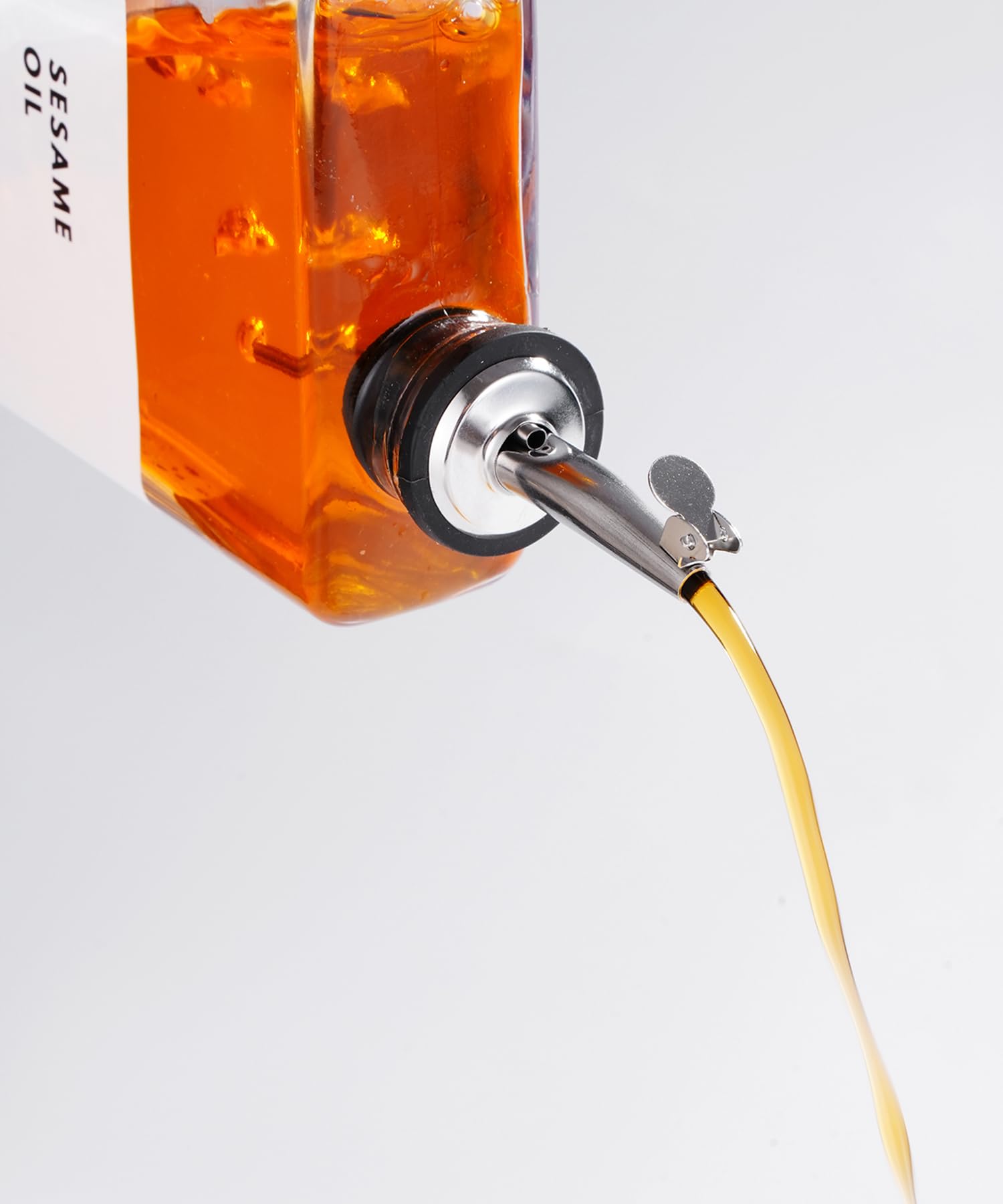 APT 1101 bottle next to spoon showing compact scale for space-saving benefit