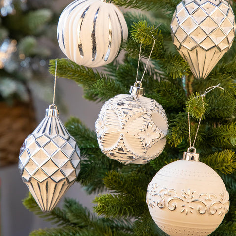 Arborus size comparison display showing four ornament sizes for balanced tree styling