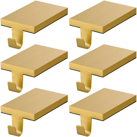 ARCHCRTC front view of two gold stocking holders showing neat placement and stability
