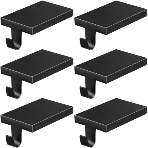 ARCHCRTC front view of six black stocking holders showing neat mantel display benefit