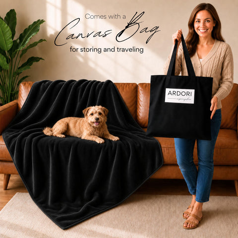ARDORI throw on sofa with dog resting demonstrating pet protection and easy cleaning