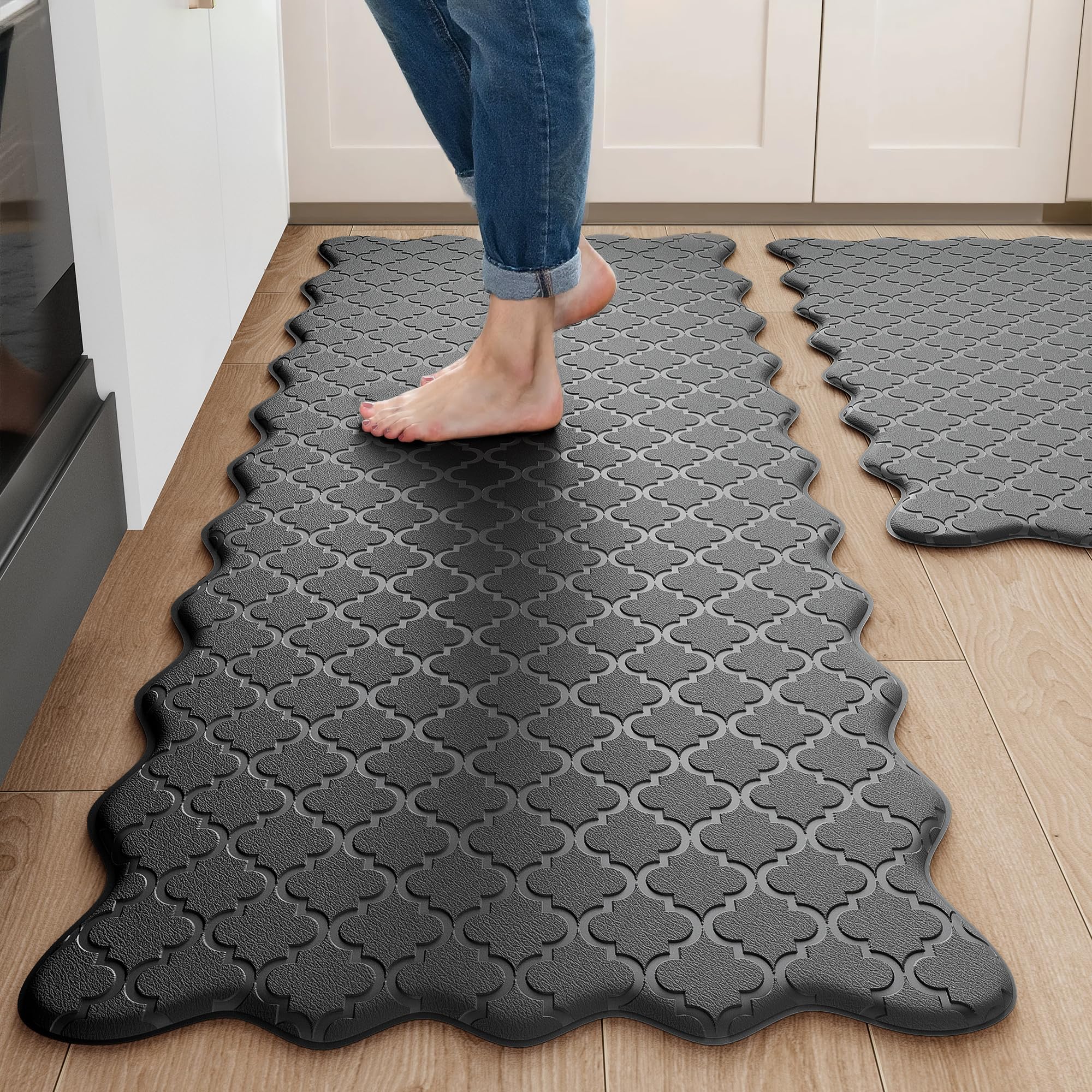Arenarug front view of black scalloped kitchen mat set showing style and coverage