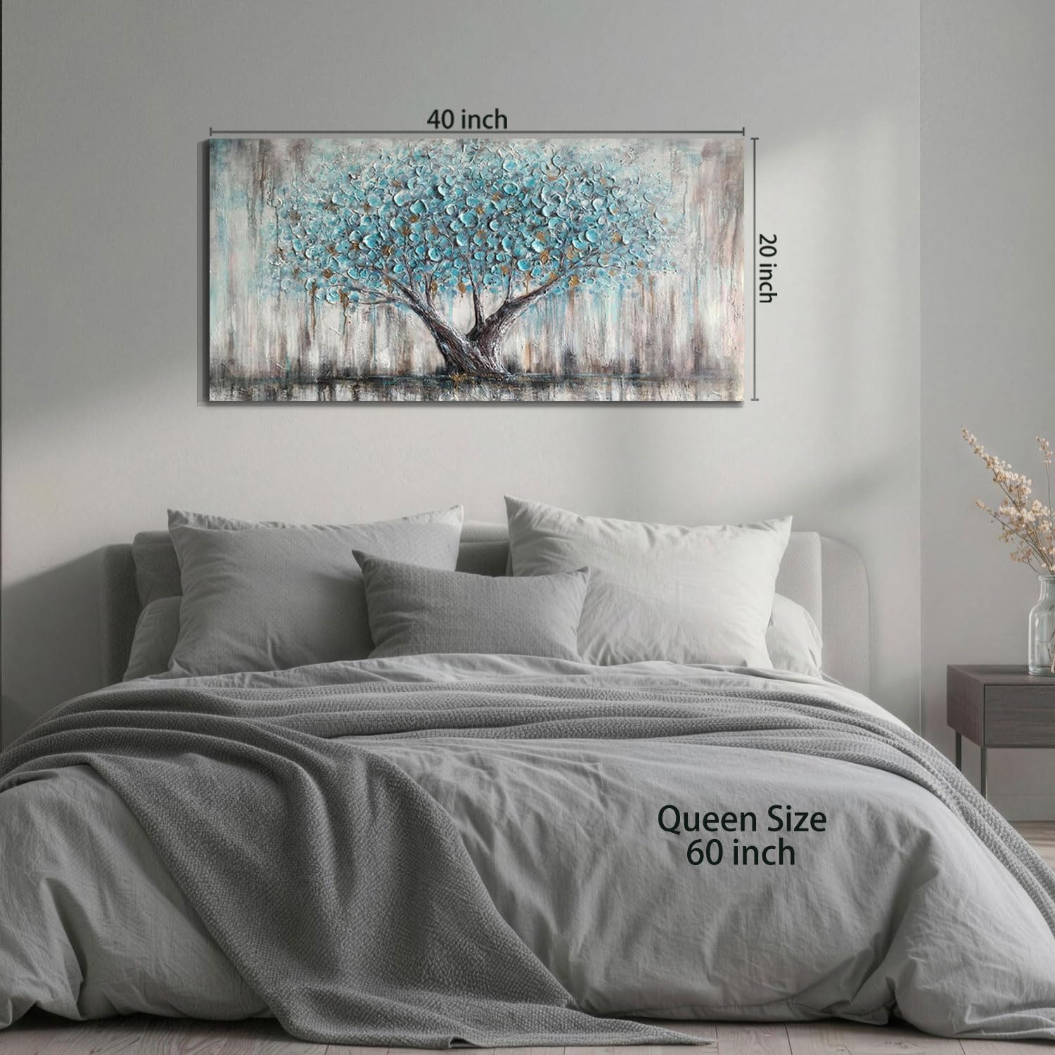 Arjun canvas above sofa in living room showing calming teal tones benefit cohesive decor