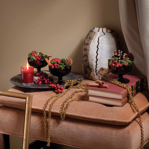 Aromatique potpourri arranged in a bowl on a coffee table adding holiday aroma and decor