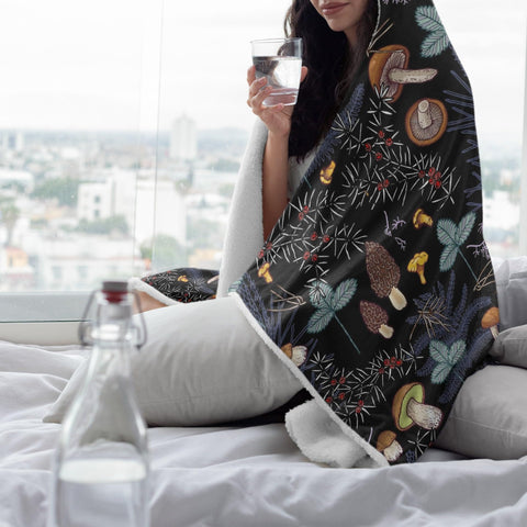 ARTIEMASTER blanket on sofa lifestyle scene adds warmth and decorative charm