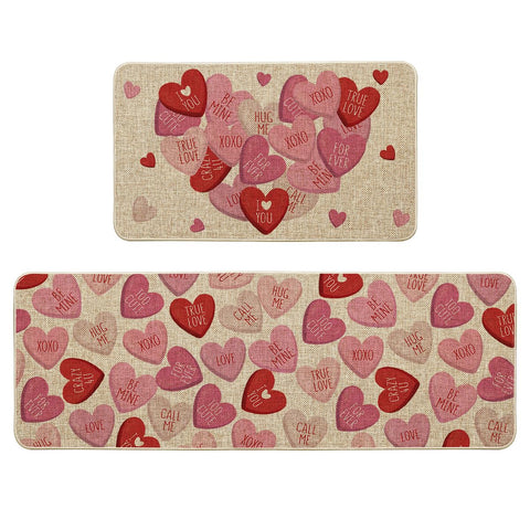 Artoid Mode front view of pink XOXO kitchen mats showing cheerful hearts and fit