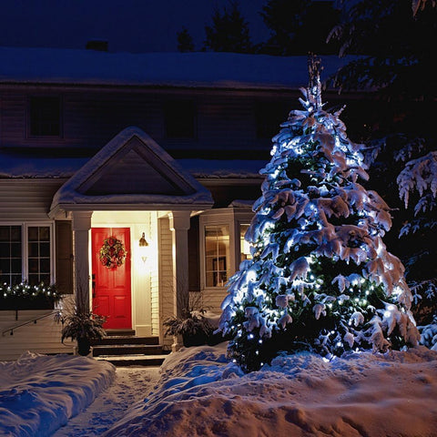 ASENEK lights wrapped on a Christmas tree, creating cozy holiday atmosphere