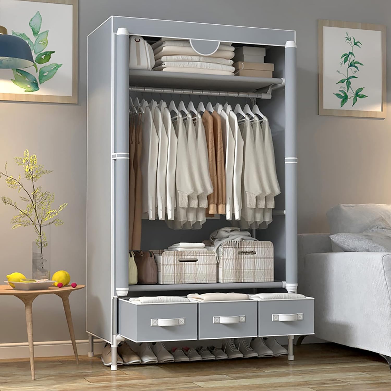 ASSICA wardrobe next to bed showing scale and compact footprint benefit