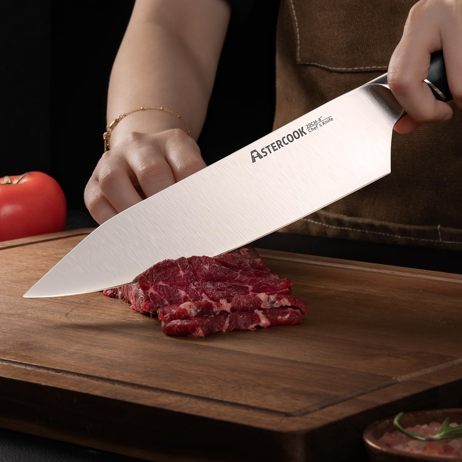 Astercook slicing vegetables in kitchen to show versatile cutting