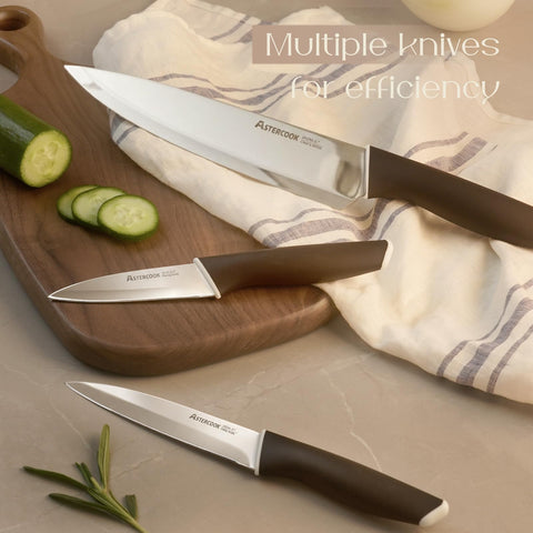Astercook Santoku and slicing knives arranged, versatile set for prep efficiency