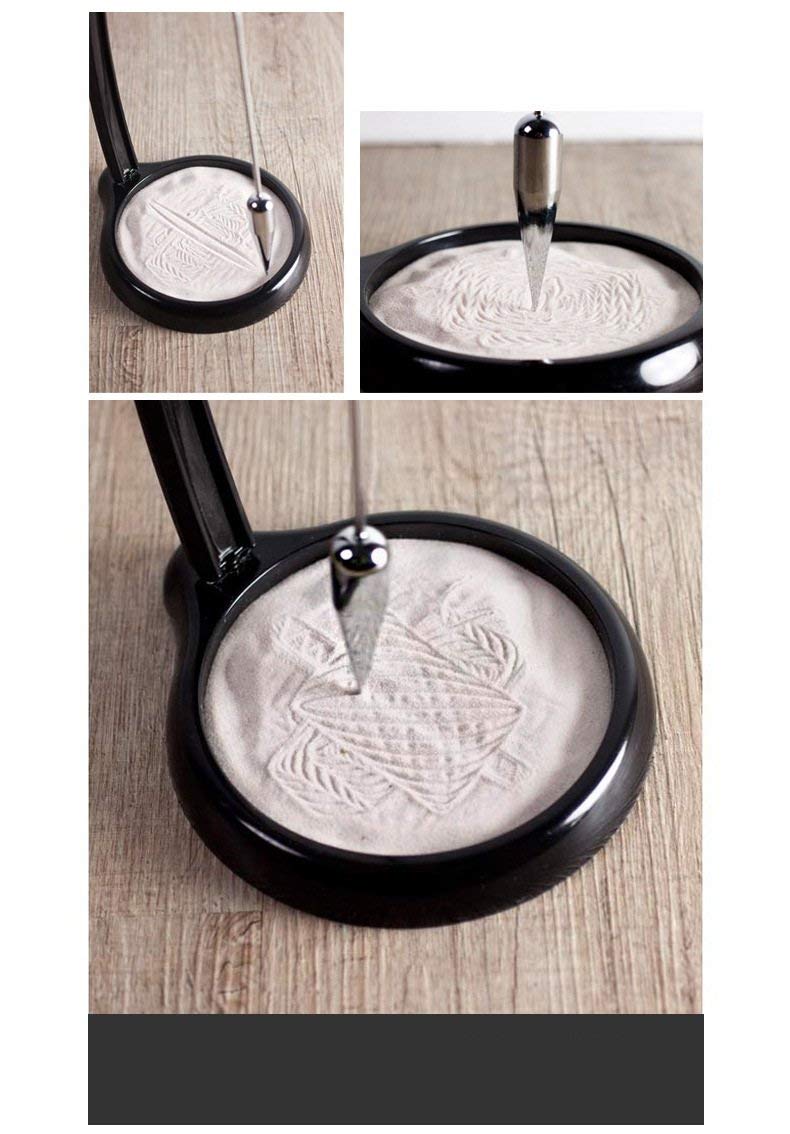 ATD sand pendulum in use on desk creating looping patterns for focus