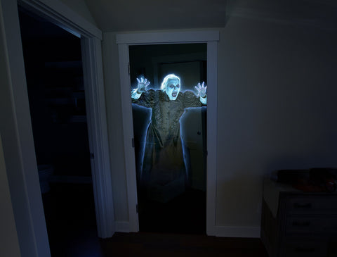 AtmosFX in living room party setup adding atmospheric haunted decoration