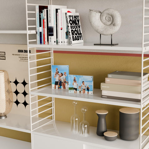 ATZYmolin mantel lifestyle with three frames creating cohesive, minimalist decor