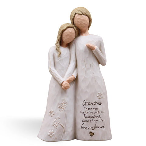 AUMELO front view of grandmother and granddaughter figurine showing loving pose and gift-ready look