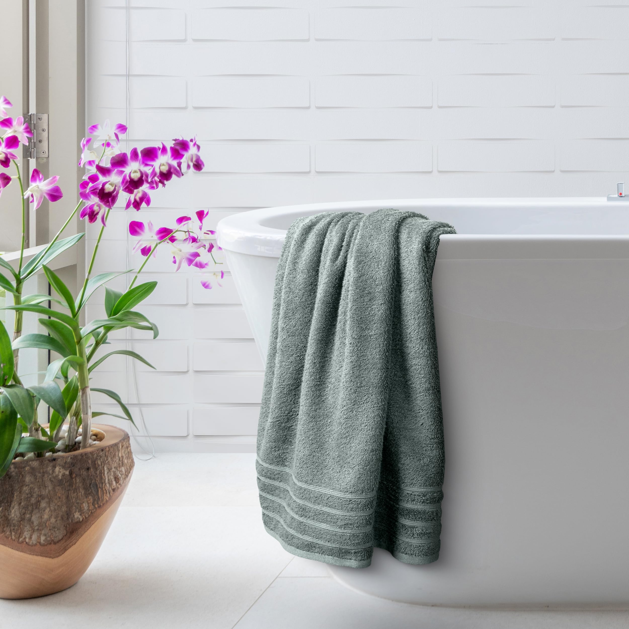 Avalon Towels hanging on towel bar showing fast-drying advantage