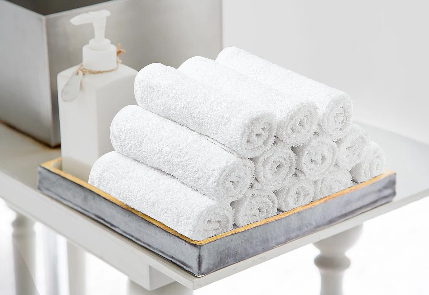 Avalon Towels in use drying a face, gentle feel and quick absorption
