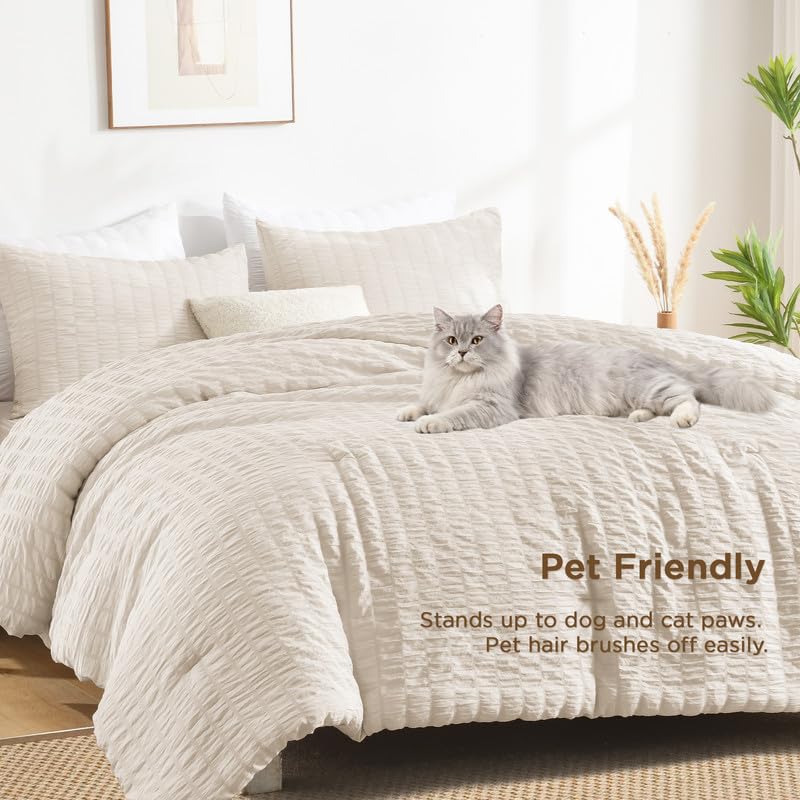 AveLom comforter styled on bed in bedroom shows versatile neutral styling benefit