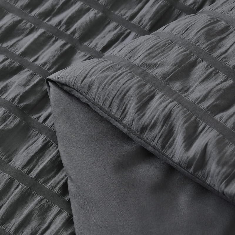 AveLom comforter with pet nearby showing hair resistance and everyday durability
