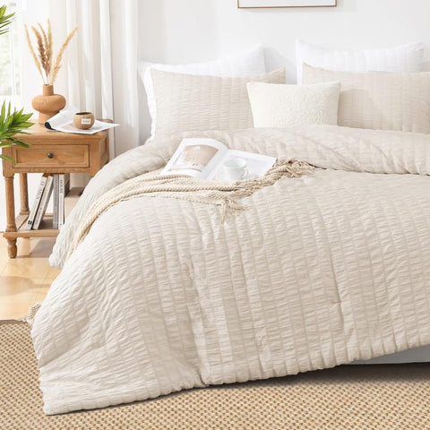 AveLom hand touching washed microfiber to show softness and breathable comfort benefit