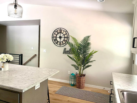 Aveyas in living room lifestyle scene enhancing interior with green focal point