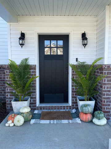 Aveyas on covered porch setting adding low-maintenance tropical ambiance