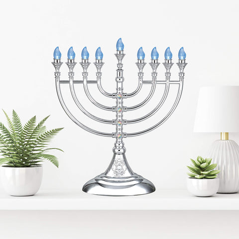 Aviv Judaica menorah styled on table with seasonal decor creating festive atmosphere
