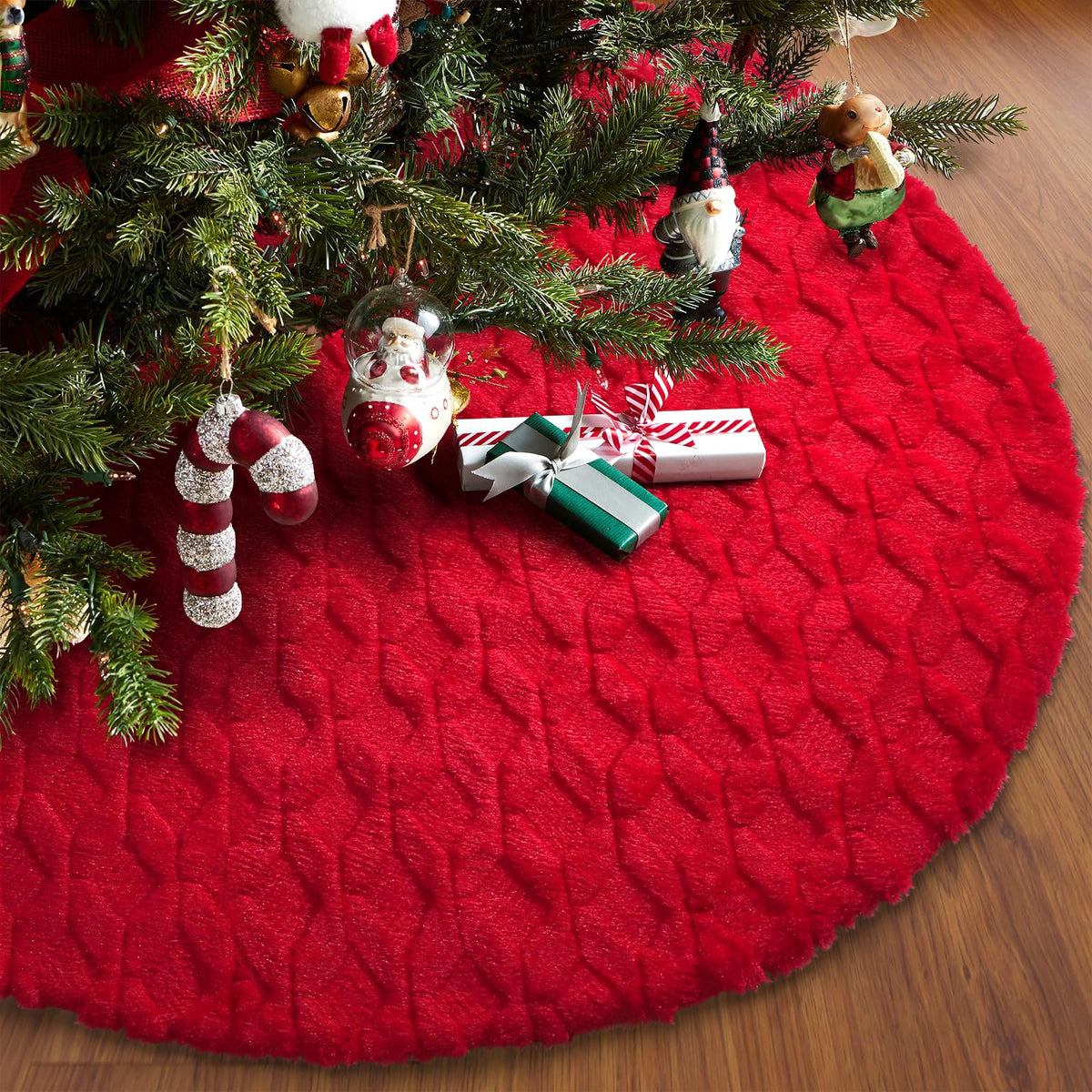 Ayieyill front view of white faux fur tree skirt showing red diamond design and festive finish