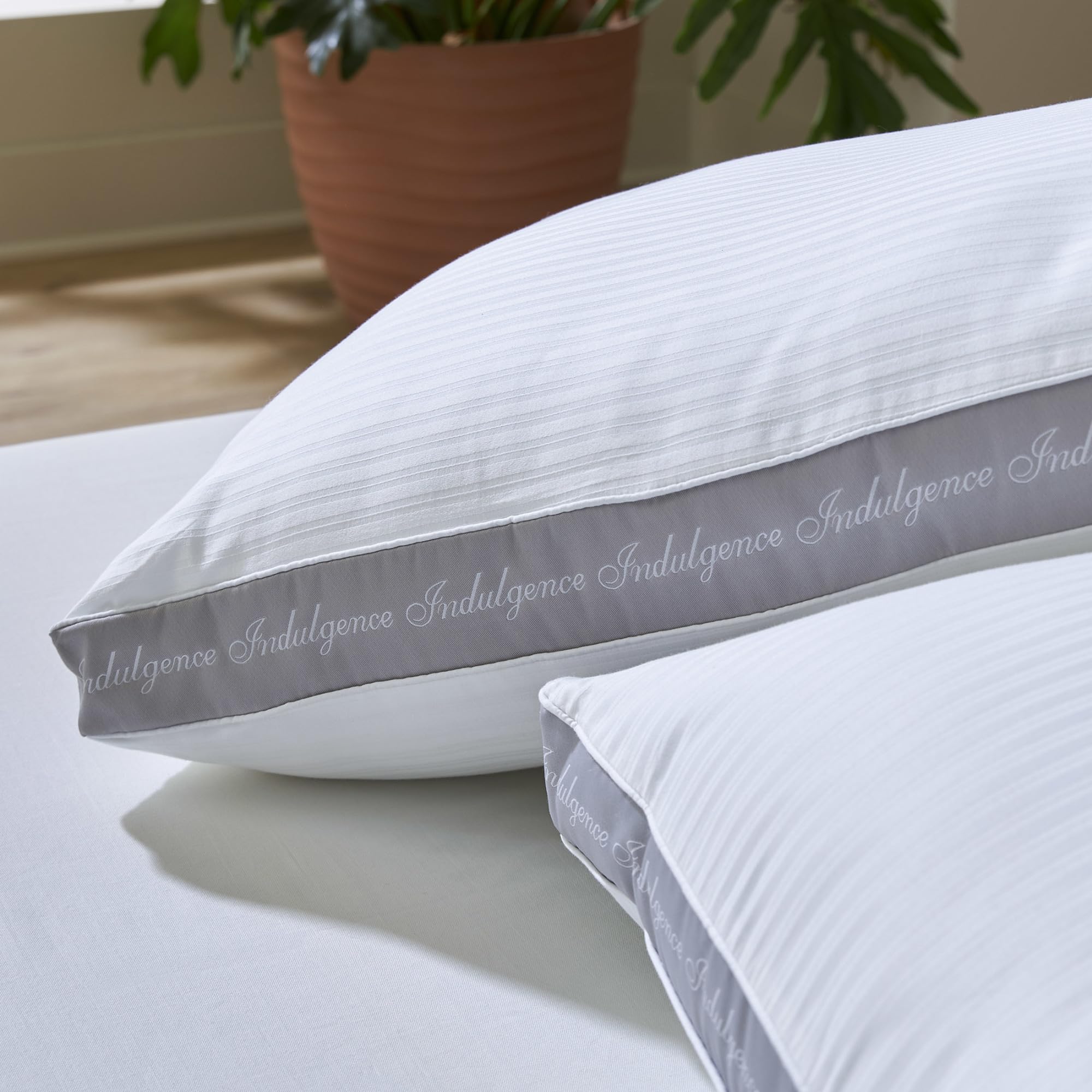 AytraHome Indulgence in-bed lifestyle image showing supportive side-sleep benefit