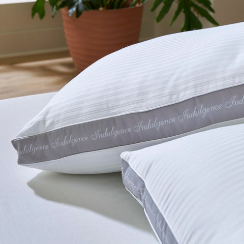 AytraHome Indulgence in-bed lifestyle image showing supportive side-sleep benefit