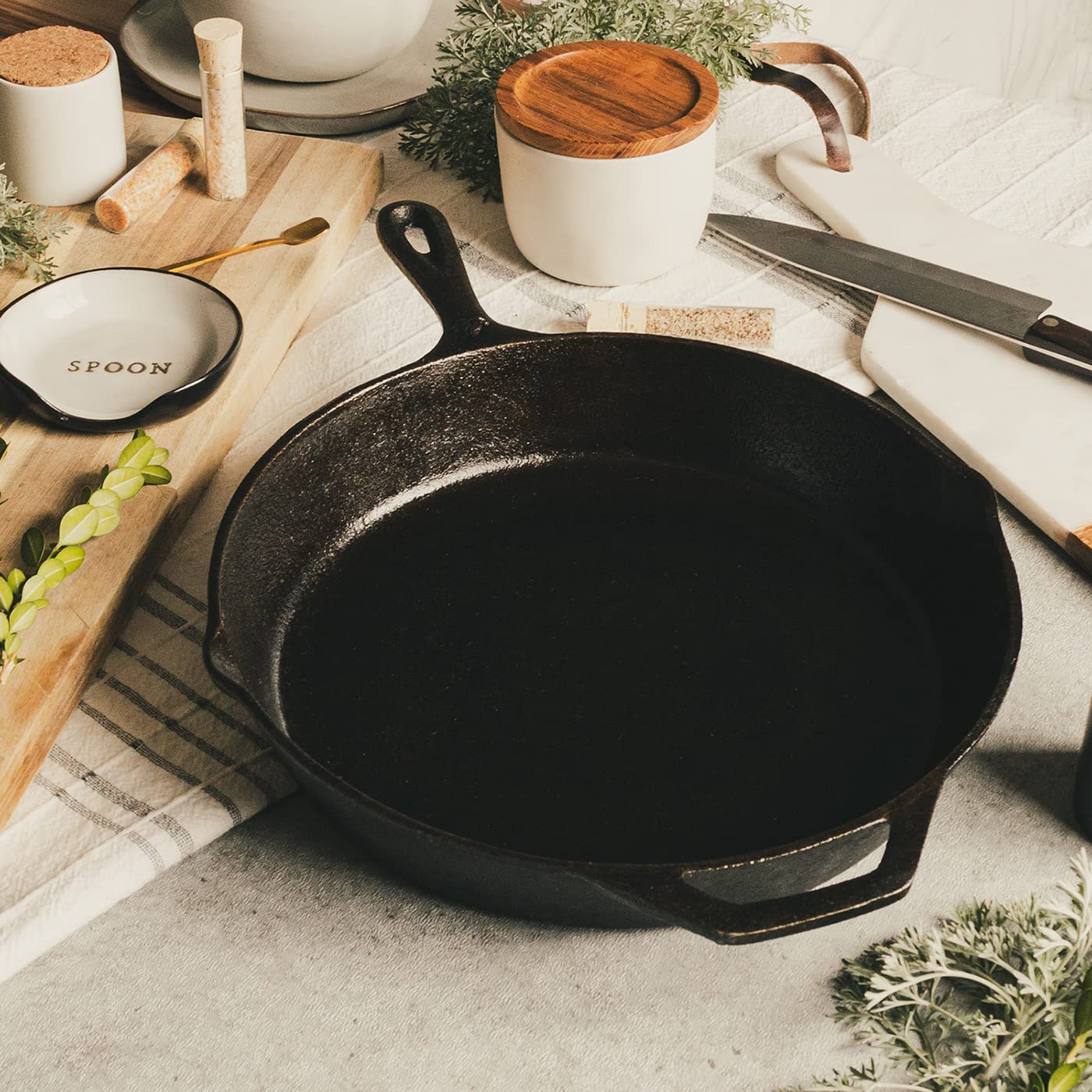 Backcountry Iron skillet in oven roasting chicken to show oven-safe versatility