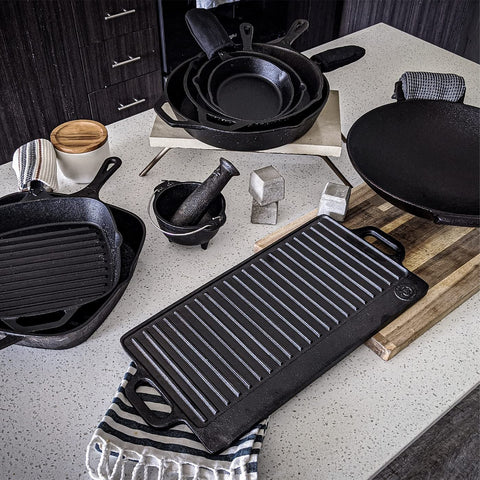 Backcountry Iron lifestyle shot over campfire showing outdoor durability and heat tolerance