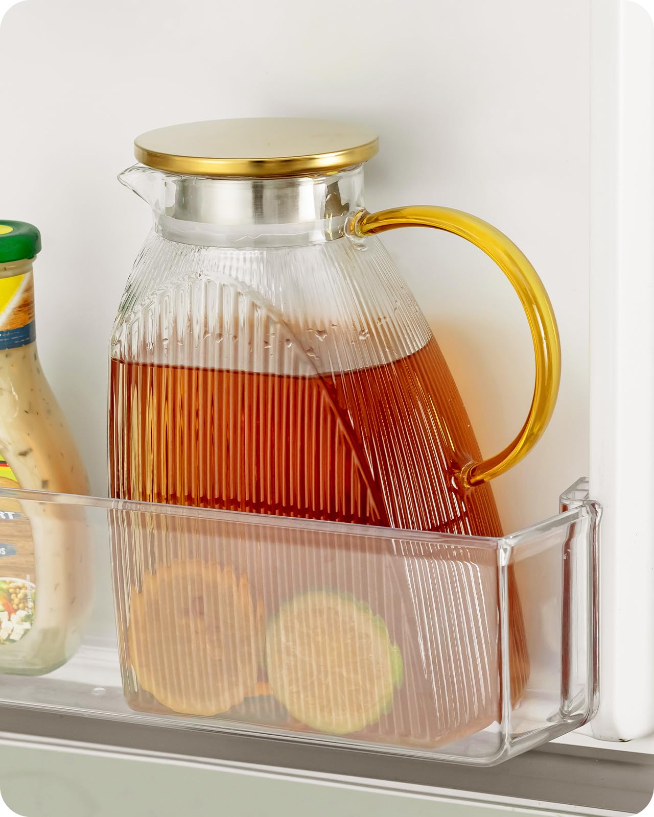 Baffect front view of glass pitcher showing slim profile and neat fridge fit