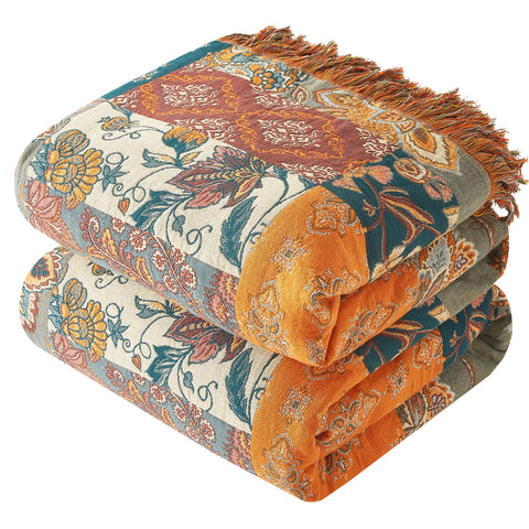 Bailix front folded blanket showing floral jacquard and inviting texture