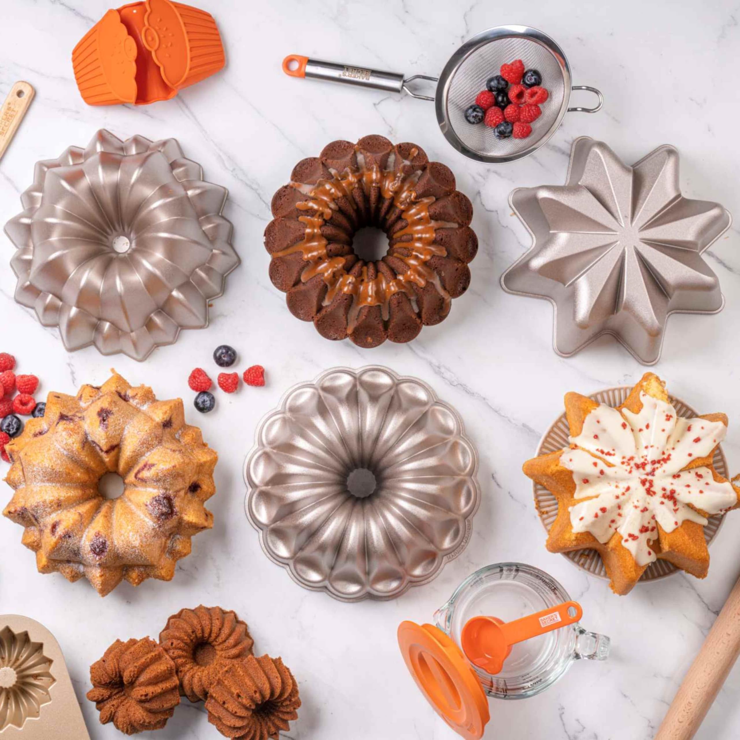 Baker's Secret plated mini fluted cakes on a serving table, elegant presentation