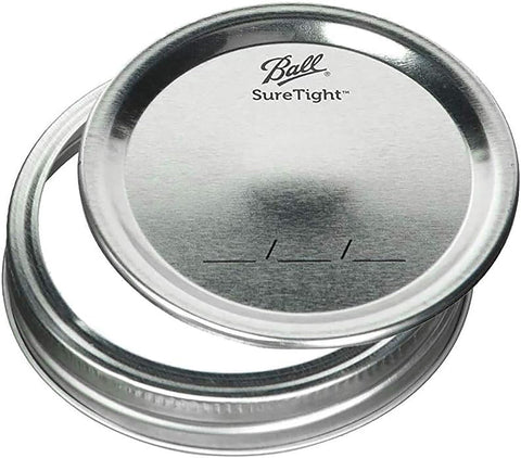 Set of Ball lids and bands on counter, highlighting airtight gaskets and rust resistance