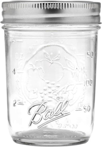 Ball jar tops and bands close-up showing sealing system and easy use benefit