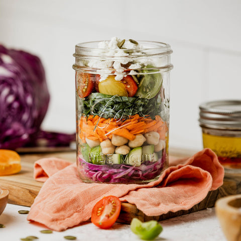 Ball jars stacked in fridge showing organized storage benefit