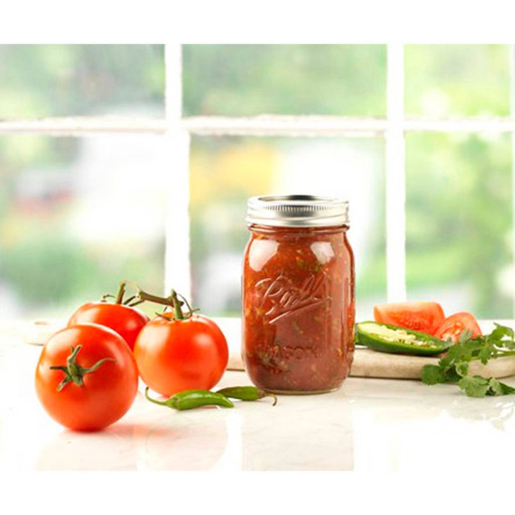 Ball mason jars staged on kitchen counter showing versatile food storage convenience