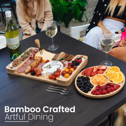Bambüsi bamboo board top view with bowls and tools for effortless serving
