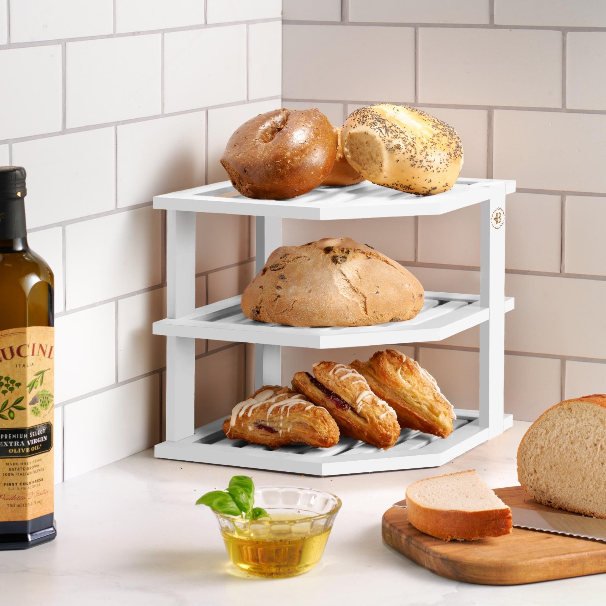 Bambüsi bottom shelf displaying bowls and cups for tidy storage