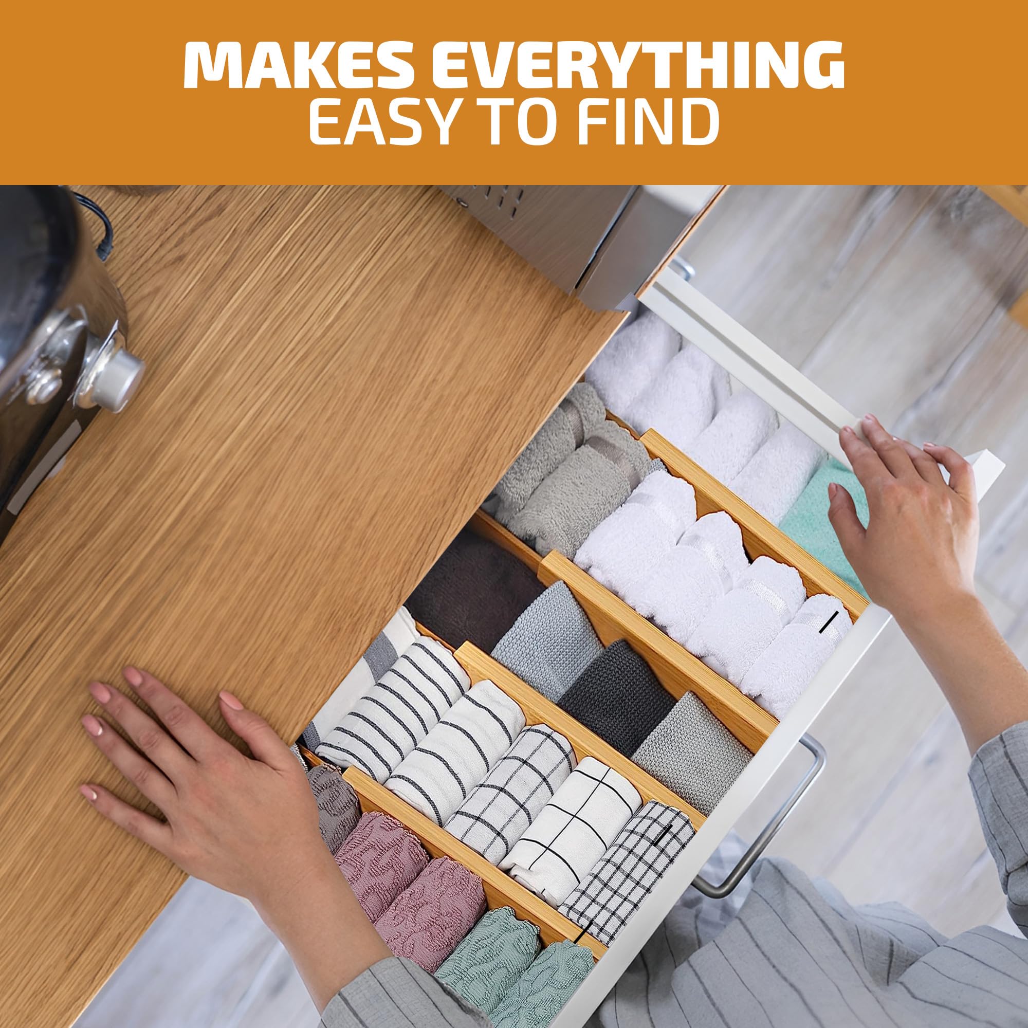 Bambüsi divider installed in kitchen drawer organizing utensils for quicker access