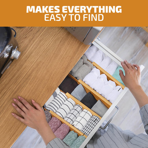 Bambüsi divider installed in kitchen drawer organizing utensils for quicker access