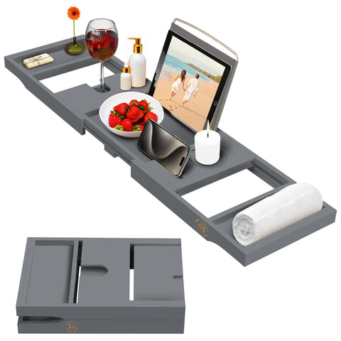 Bambüsi lifestyle image with candles and book creating a calming spa-like bath scene